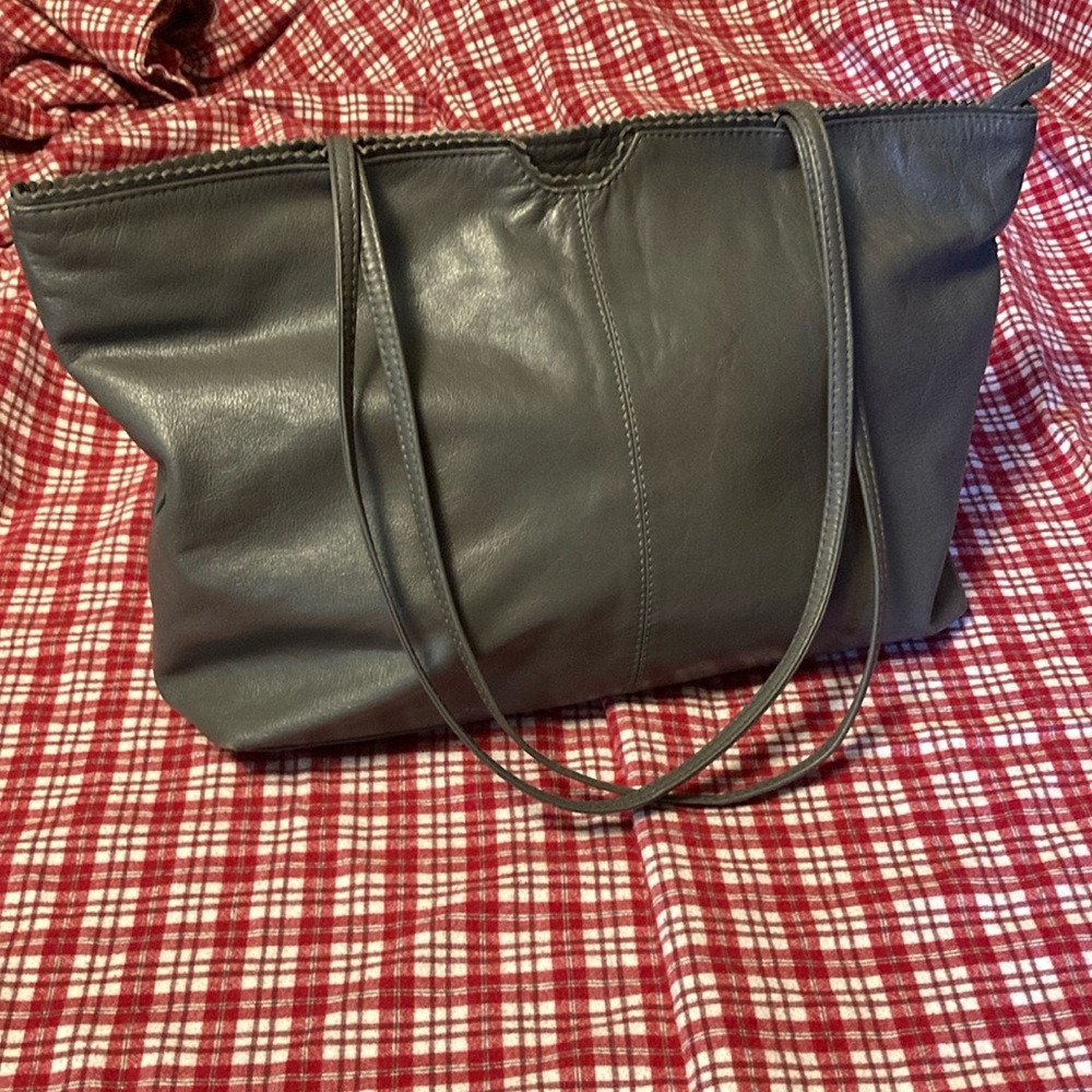 Latico genuine leather bag grey in color.